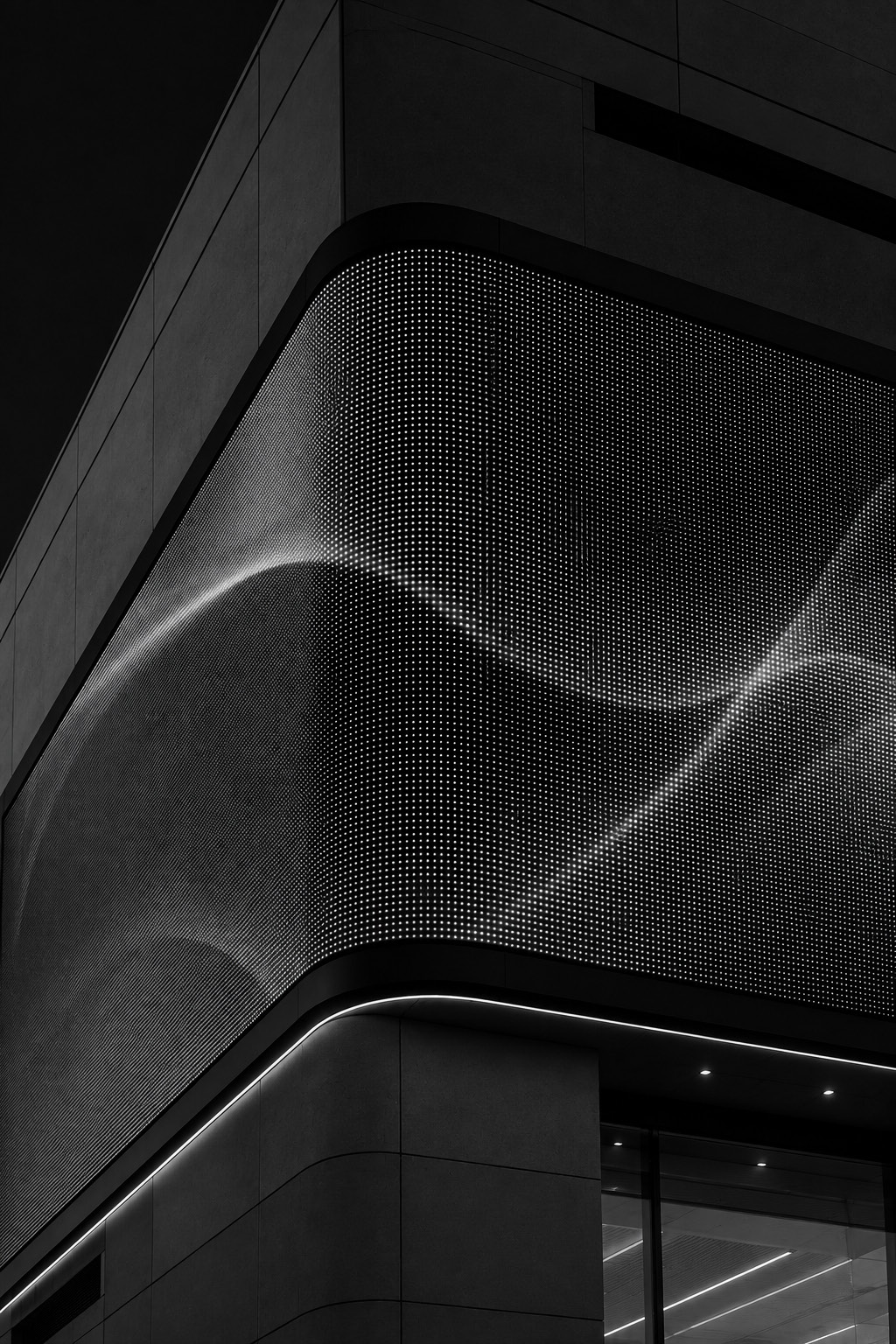 Curved LED media facade on a building corner